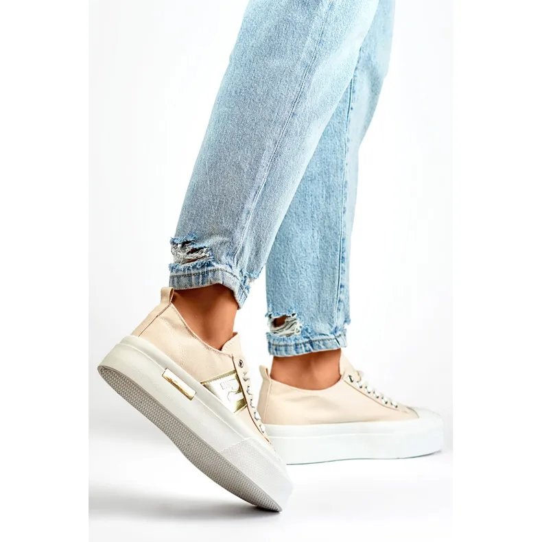 Beige fashionable women's sneakers with a thick platform sole