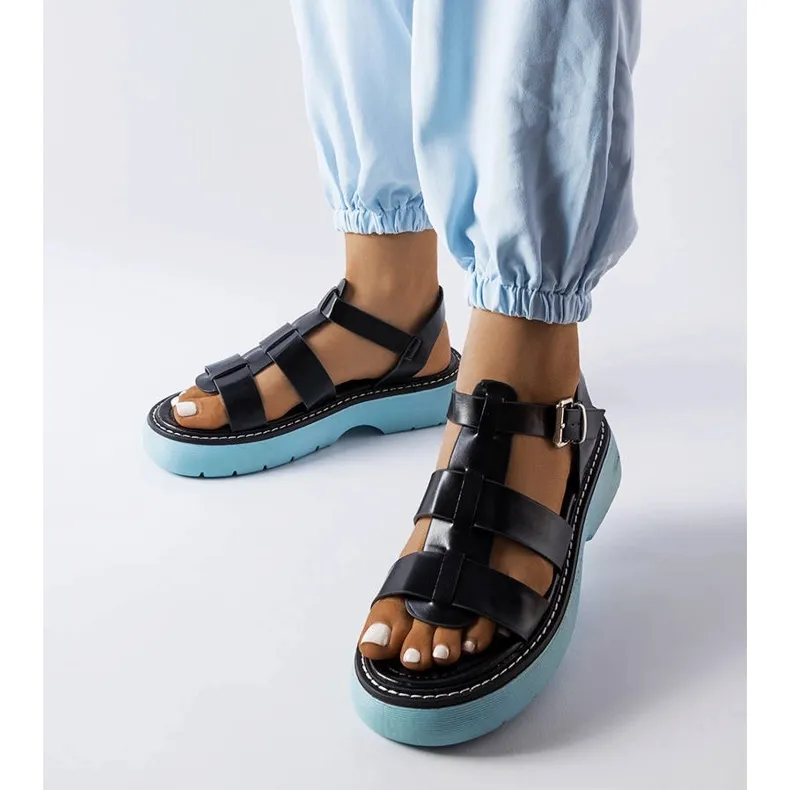 Black sandals on a blue platform from Lola