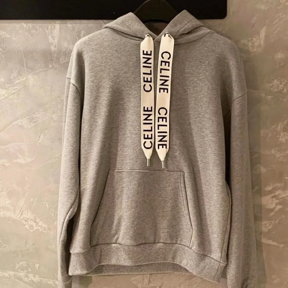 CELINE  |Loose hooded sweatshirt in cotton fleece