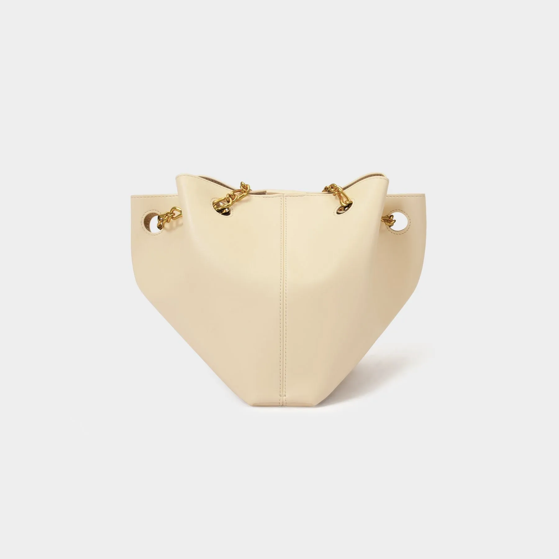 Nanushka  The Gather Bucket Bag in Beige Vegan Leather