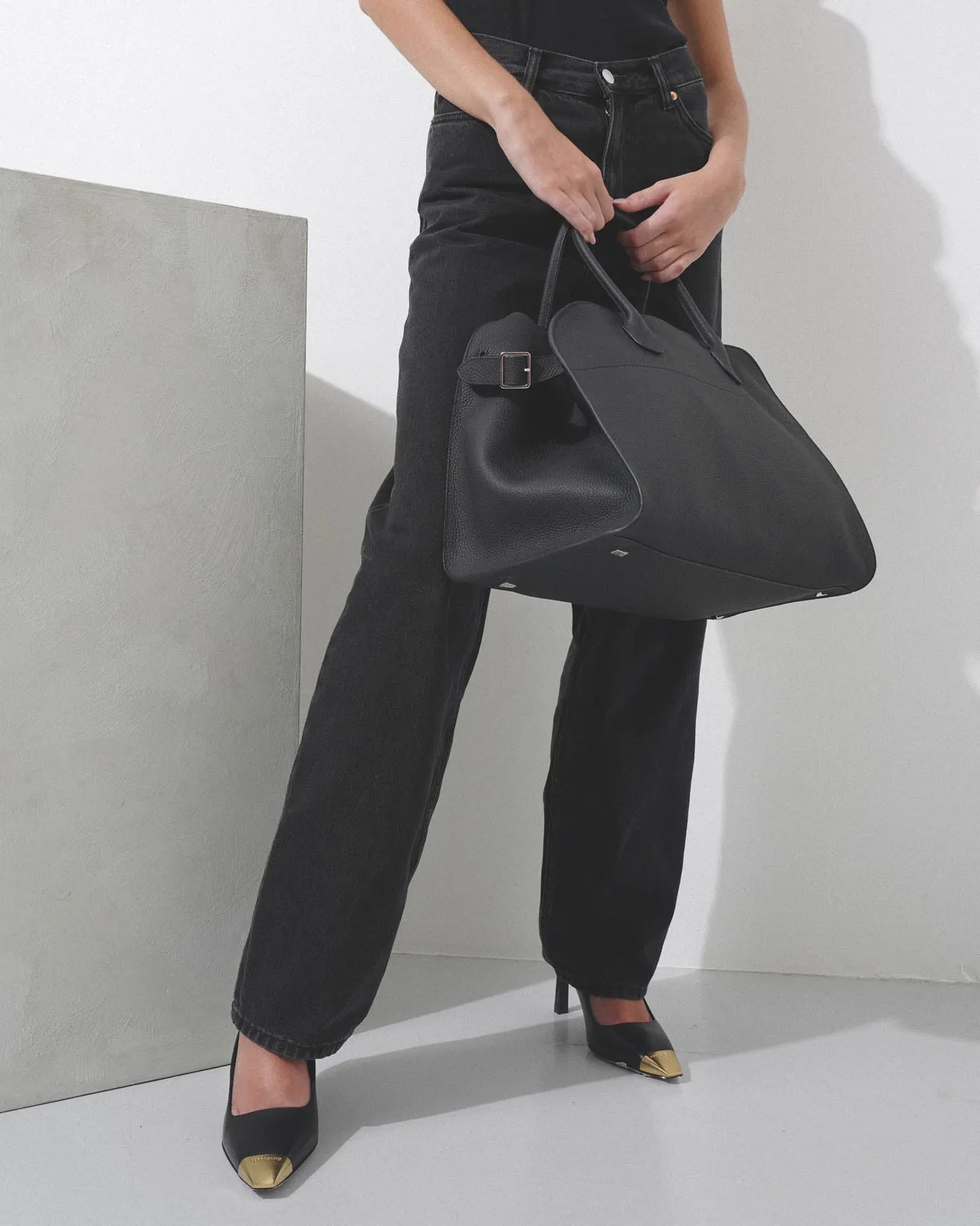 The Row Soft margaux 15 black grained leather bag